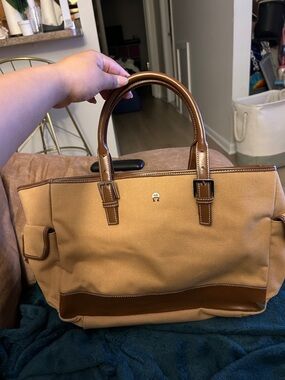 Etienne Aigner Tan Canvas Duffel with Brown Leather Trim